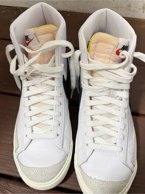Nike White High-Top Sneakers with Black Swoosh and Cream Tongue